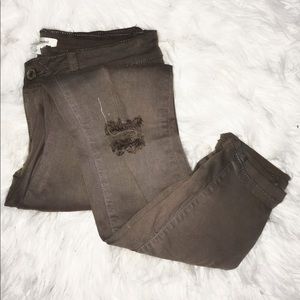 Washed out green jeans